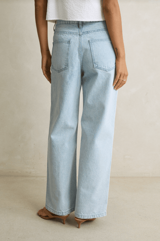 RHYTHM Weekender Asymmetric Denim Jean in Light Wash